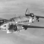 Hudson aircraft flying with a Mk.I lifeboat