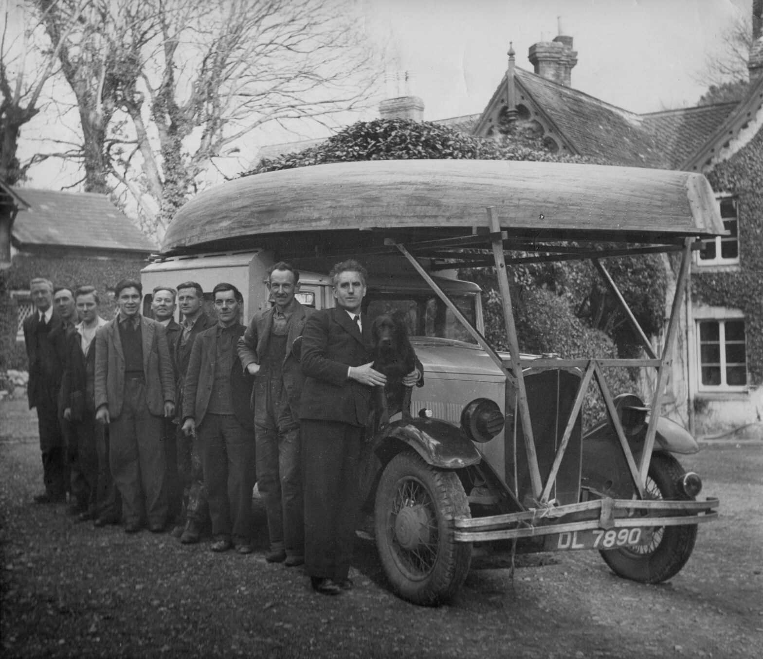 Uffa and team with lifeboat loaded on his car (photo: from the Uffa Fox Archive)